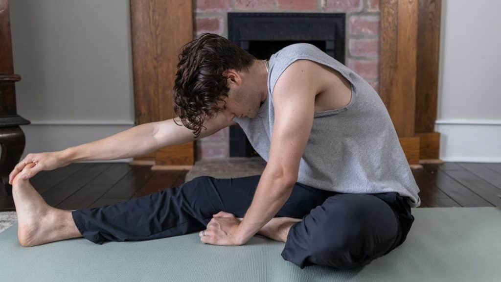 A man stretching before the workout.