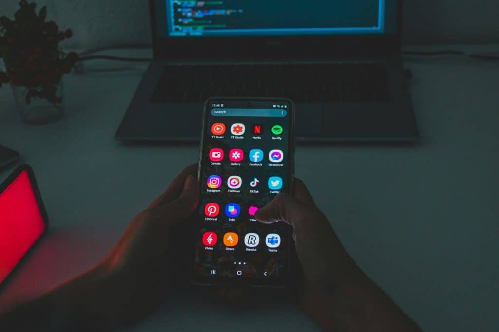 A picture of a person using phone.