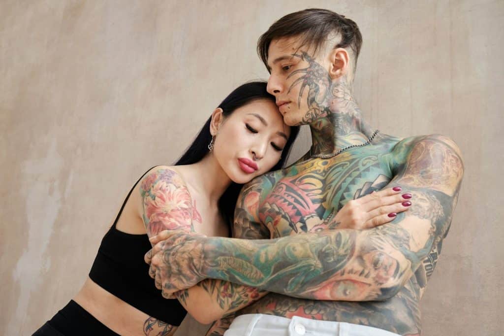 A couple embracing each other.