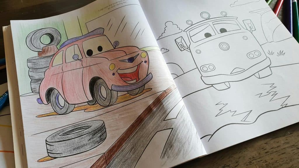 A partially colored cartoon car in a coloring book.