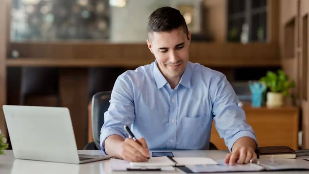 Thoughtful man reflecting alone writing his relationship expectations