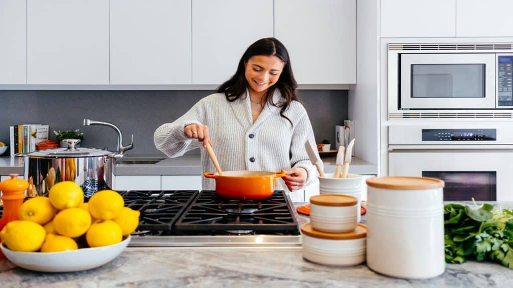 A woman cooking for her family