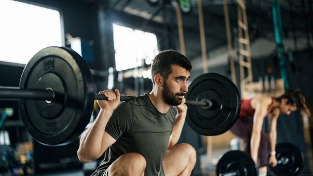 Man doing resistance training to build strength and maintain muscle
