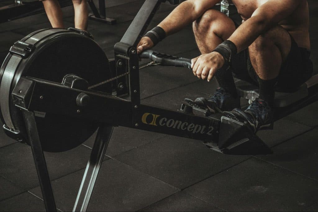 A man using a machine in the gym