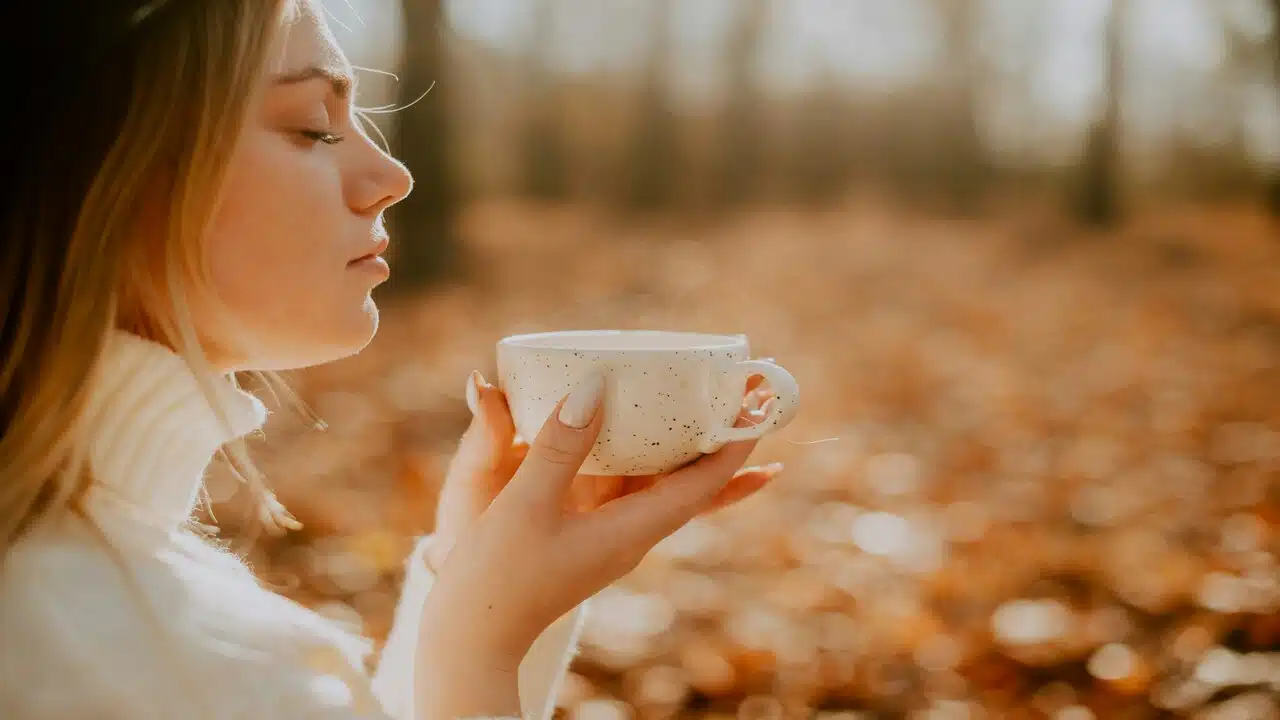 A woman having coffee alone.