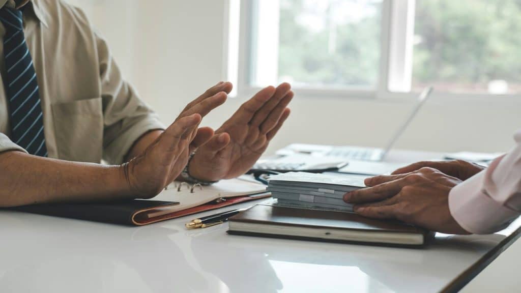 A person refusing a bribe