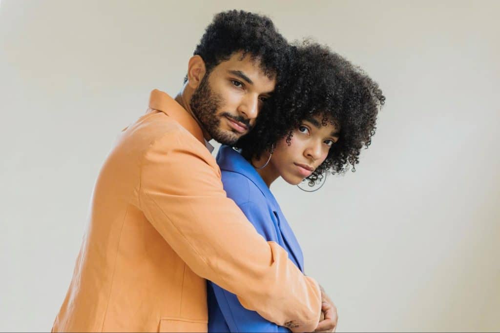 A man hugging a woman