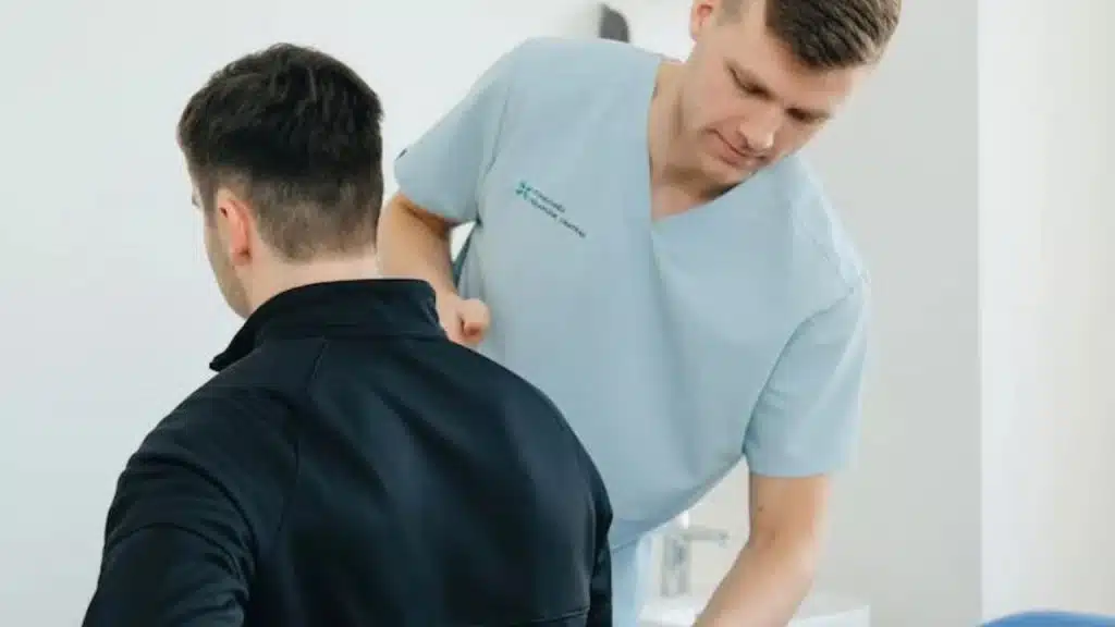 Man receiving a health checkup during a doctor’s visit