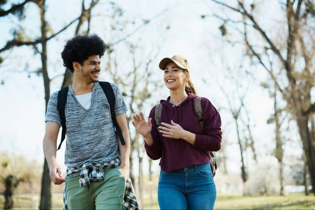 A man and woman being happy while talking