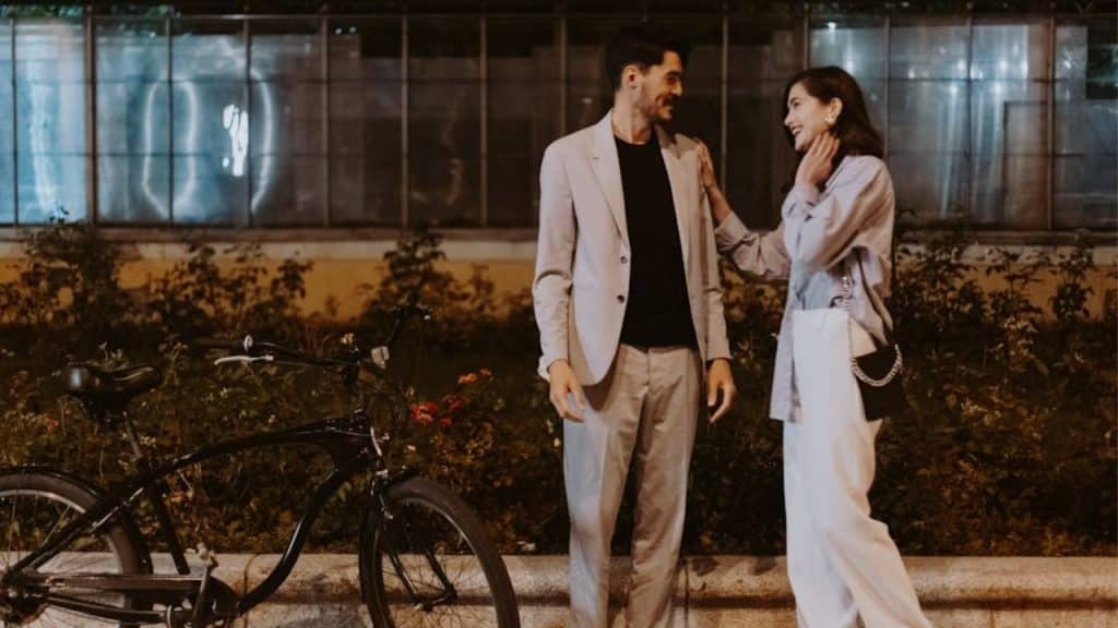 Woman pausing before leaving, signaling interest in continuing the interaction