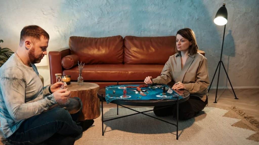 Couple playing board game.
