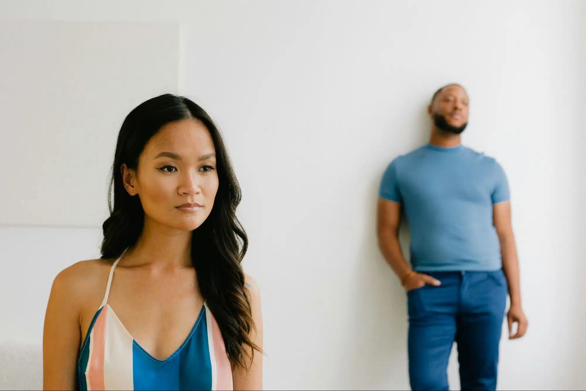 A man looking at the woman.