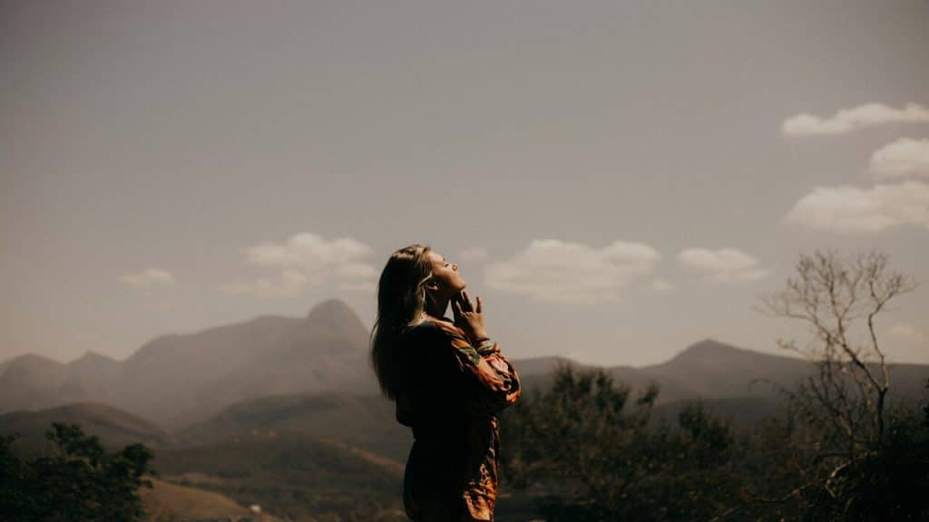 A woman standing on a field