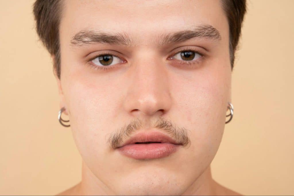 A man with a well-maintained beard.