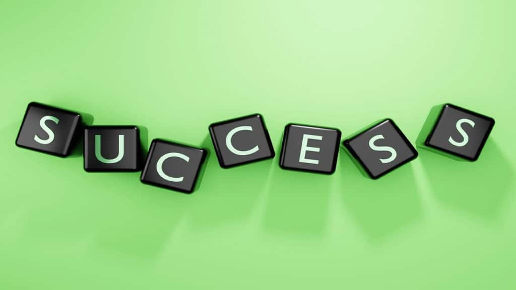 Cubes spelling out “success”.