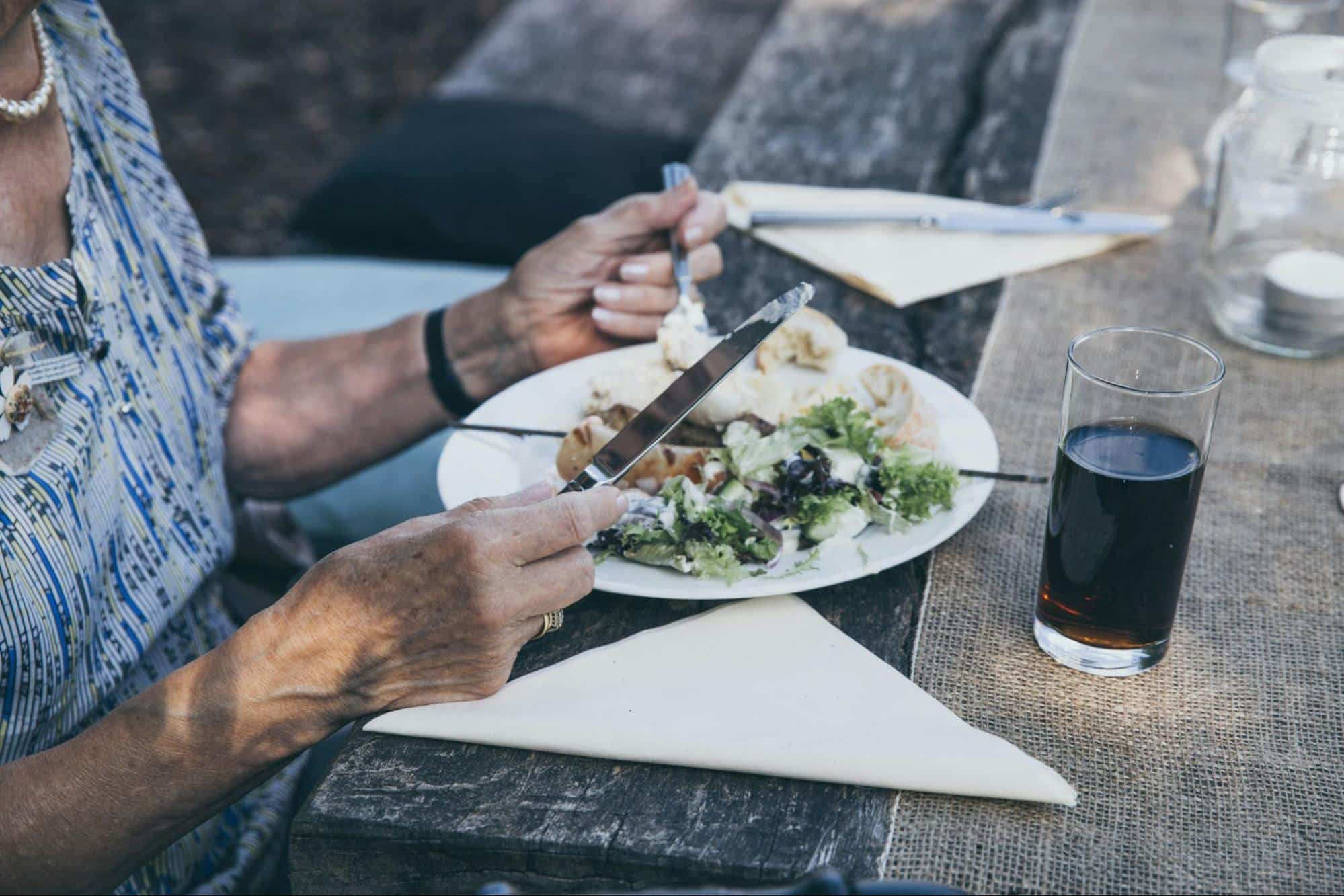 A picture of a man eating a healthy food.