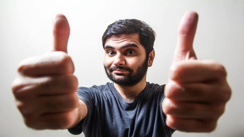 A man giving two thumbs up
