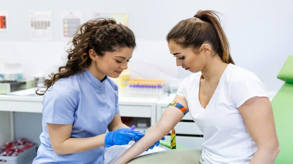 A woman getting her blood drawn