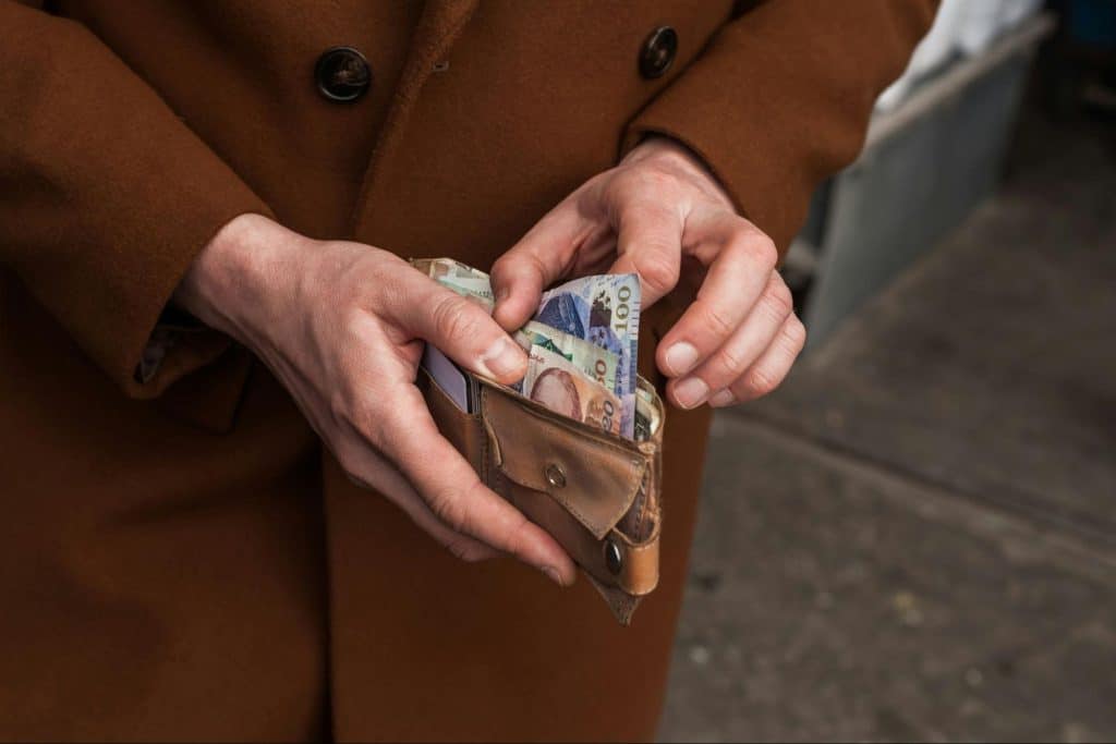 A man holding a wallet 