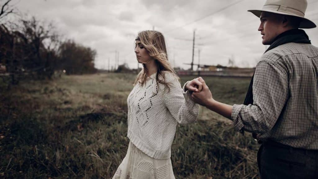 Woman walking away calmly after an unresolved issue with her partner