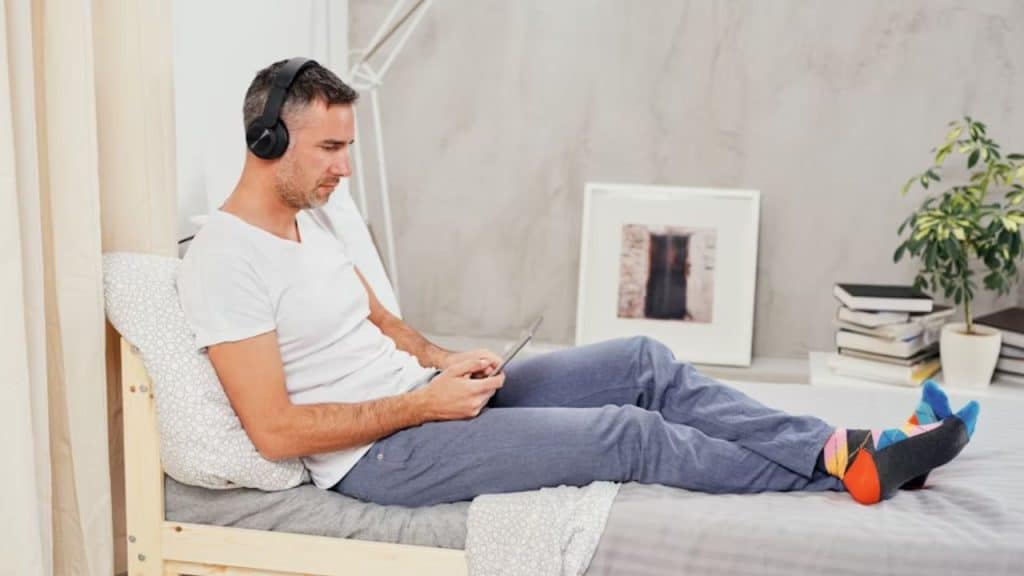 Man enjoying a simple, grounded moment alone in his home