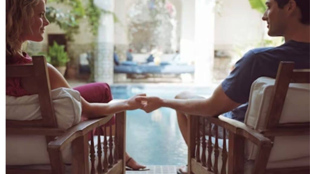 Woman’s body turned toward one man, suggesting nonverbal attraction