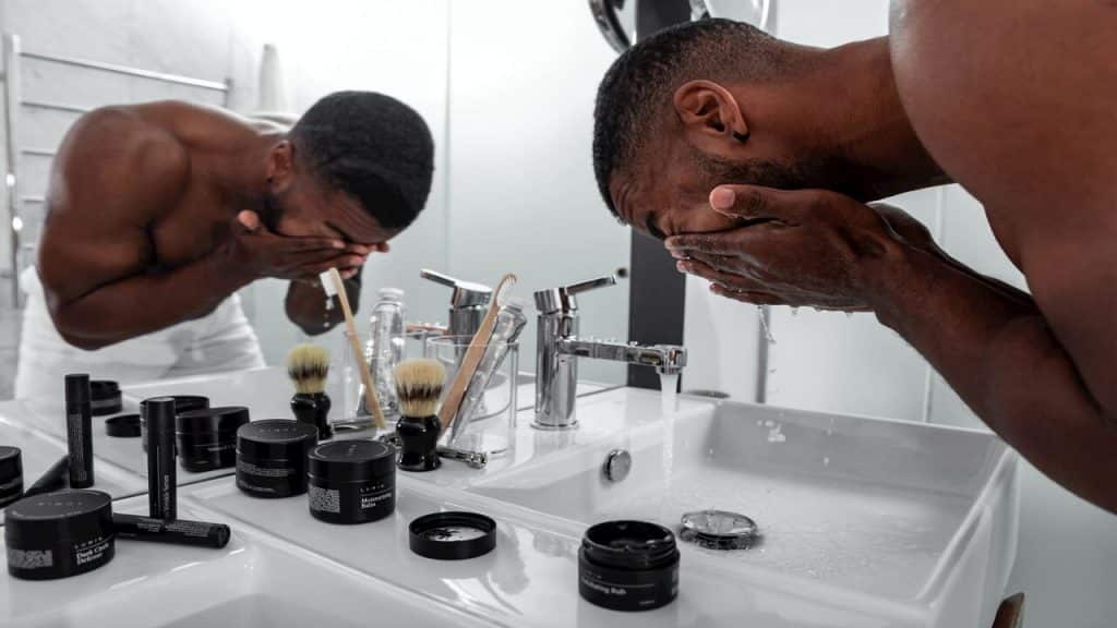 A man doing his skincare