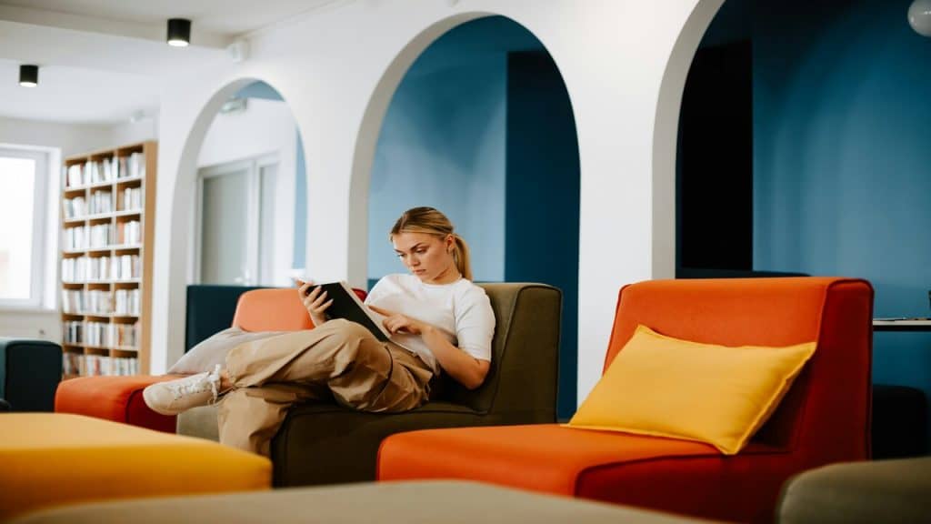 A woman studying at a lounge