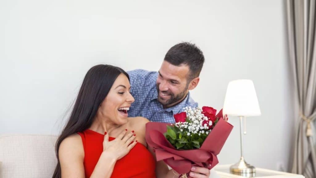 A man surprising his partner after a solo retreat