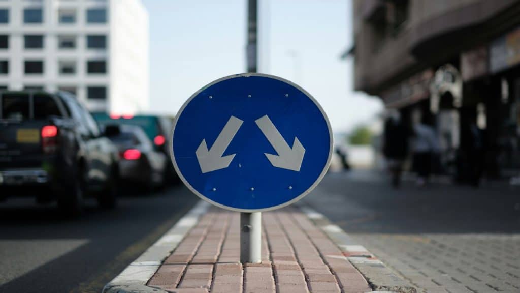 A road sign depicting two choices