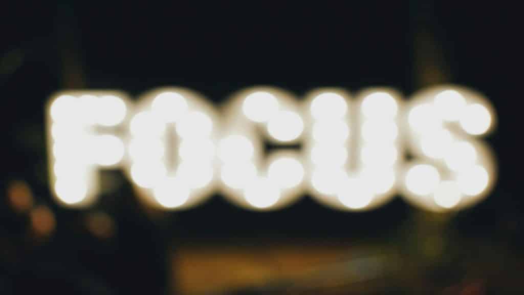 Neon signage saying “focus”