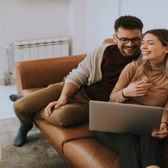 A mature couple doing the bills at home
