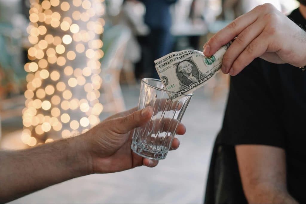 A man giving a tip.