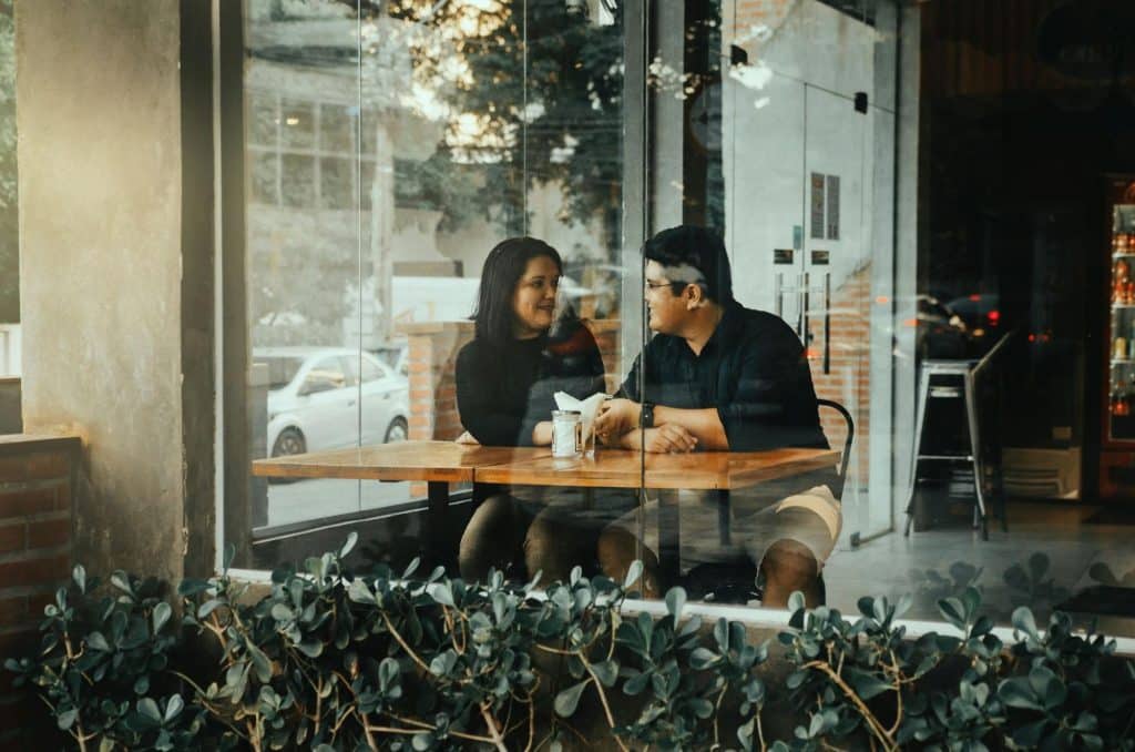 A man and woman at the cafe