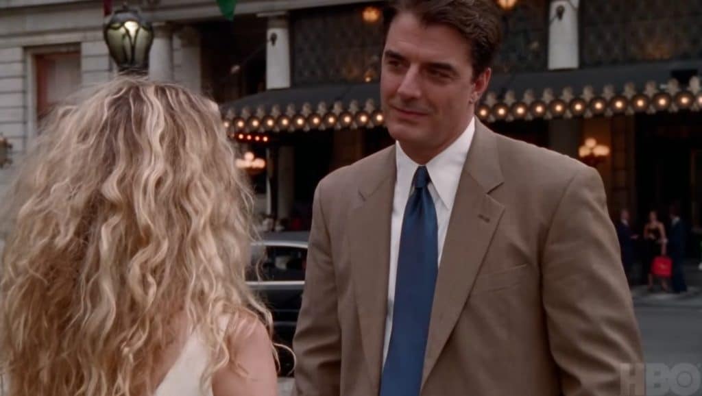 A picture of big looking at carrie
