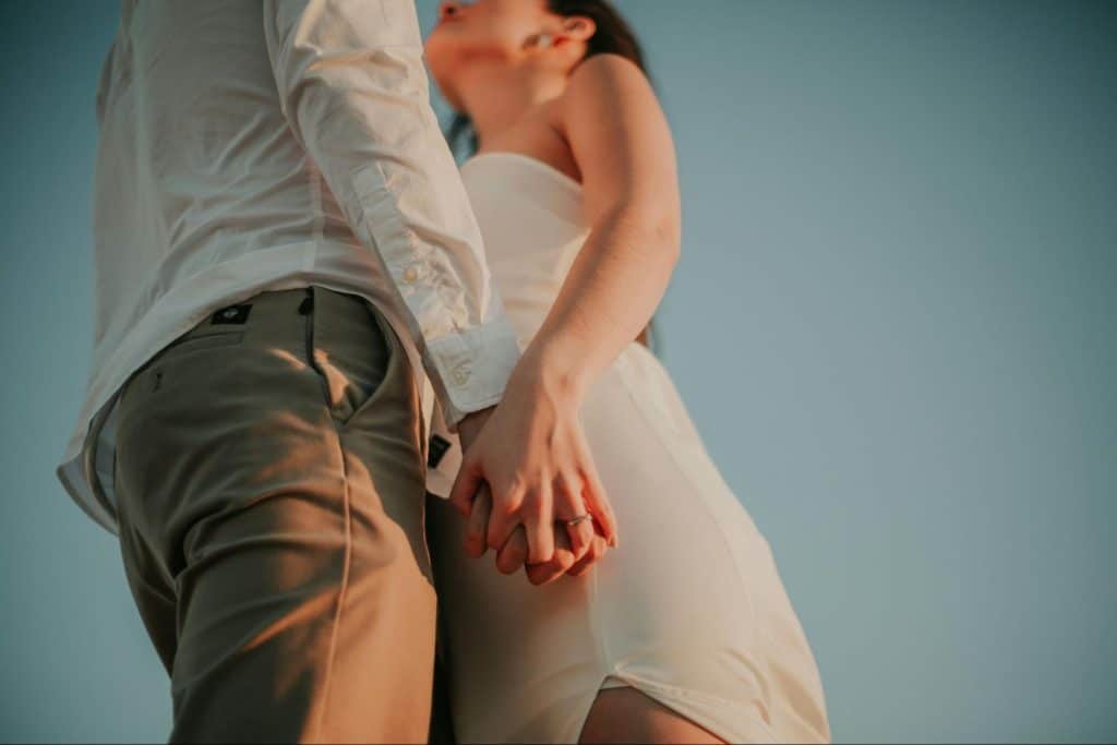 A man and woman facing each other