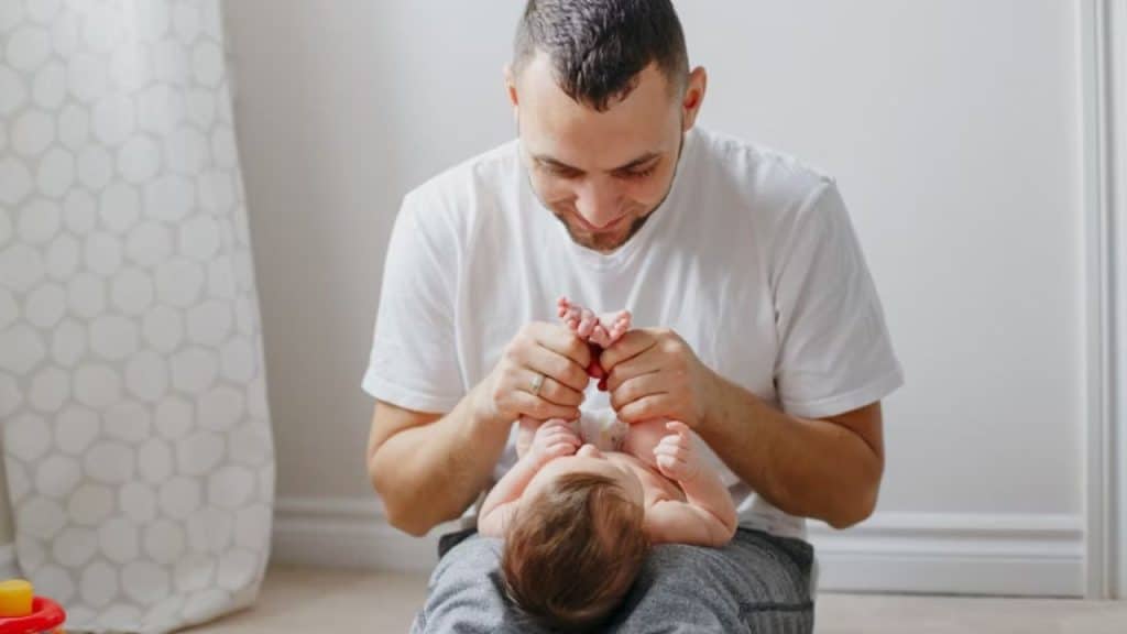 Father spending peaceful quality time with his child on the floor