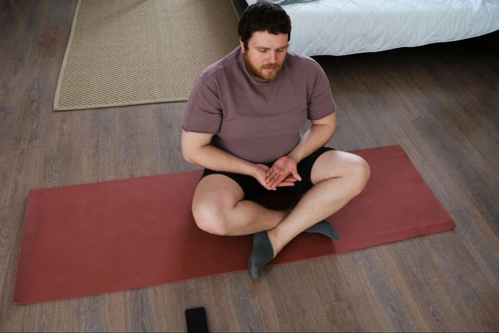 A man doing a home work-out.