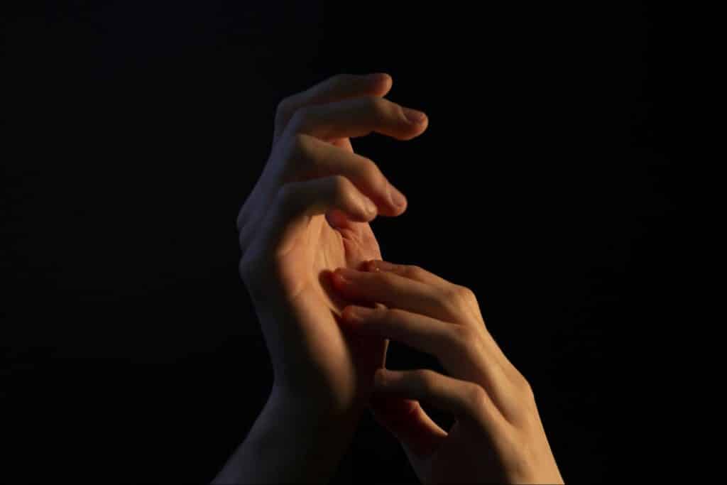 Hands of a man.