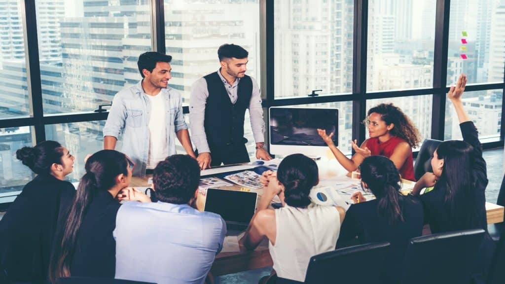 A group of people having a meeting