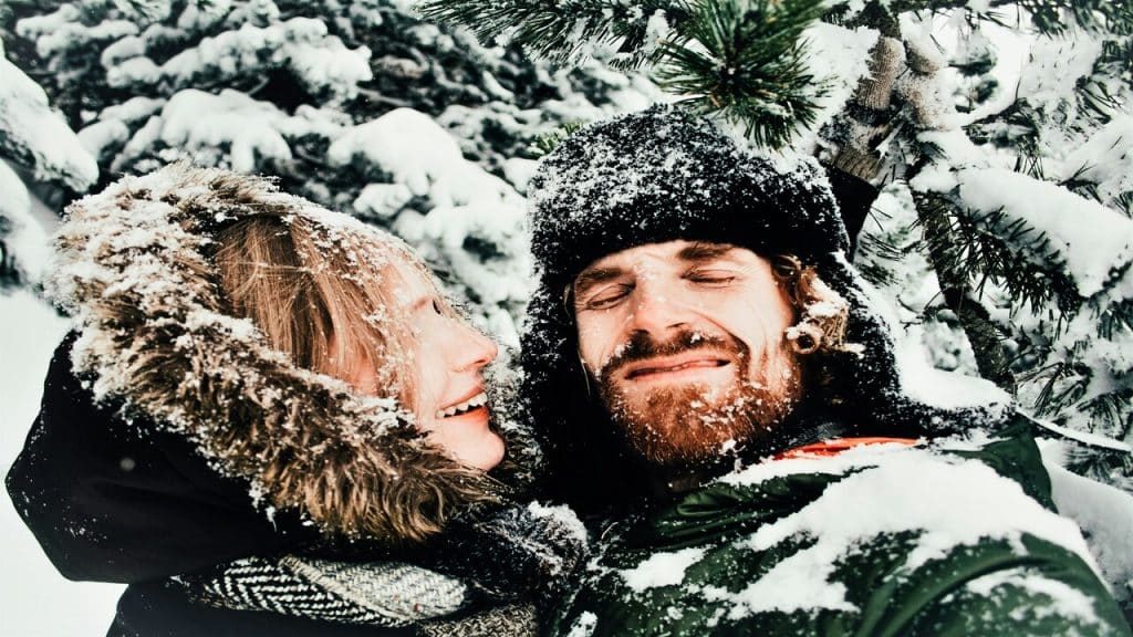 A couple being silly in the snow
