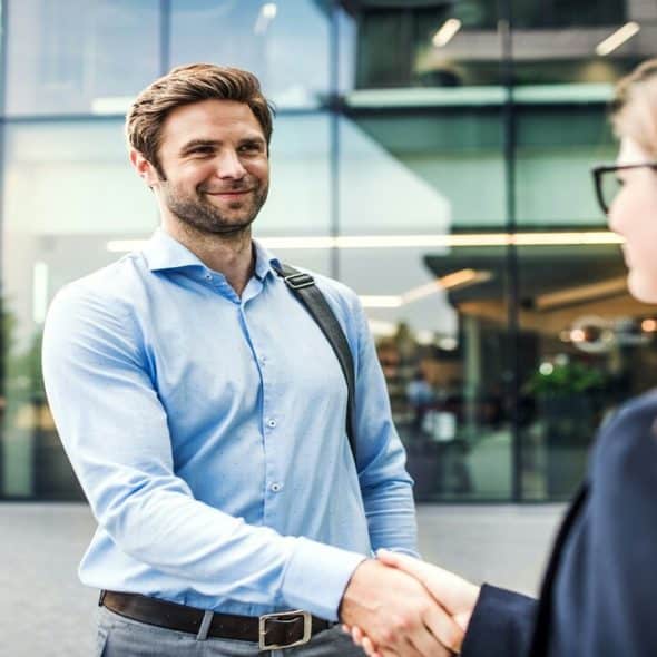 Colleagues shaking hands