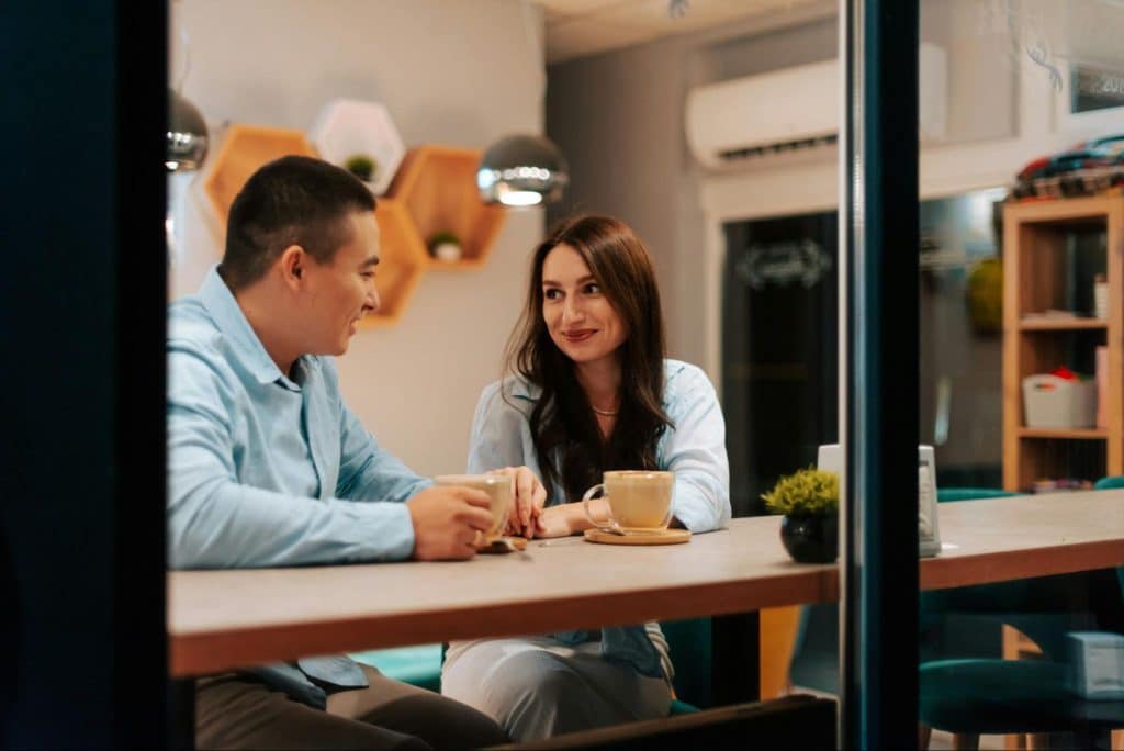 A man and woman at the food restaurant.