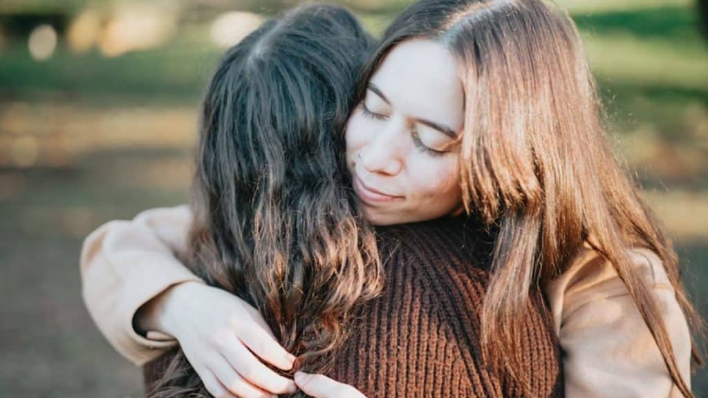 Woman emotionally confiding in someone else instead of her partner
