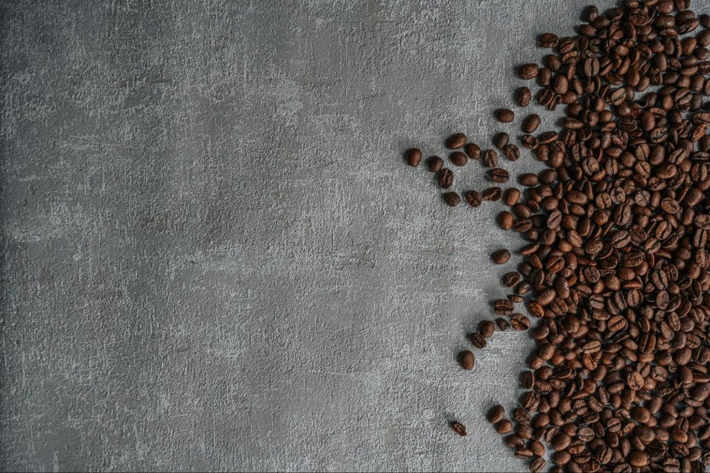 A picture of coffee bean on a table.