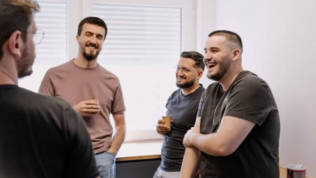 Male friends sharing a hearty laugh together