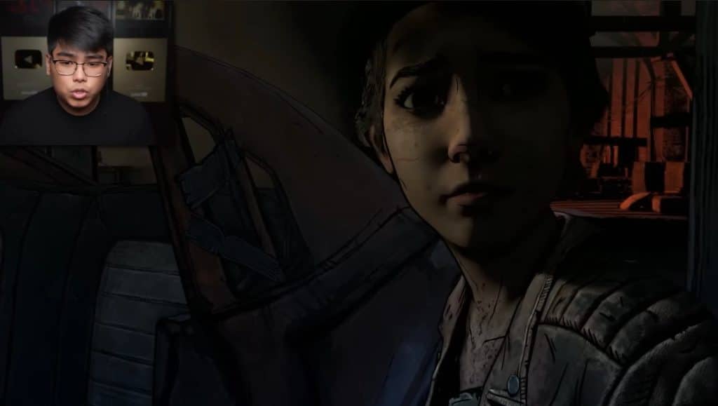 A picture of a vlogger reviewing this scene