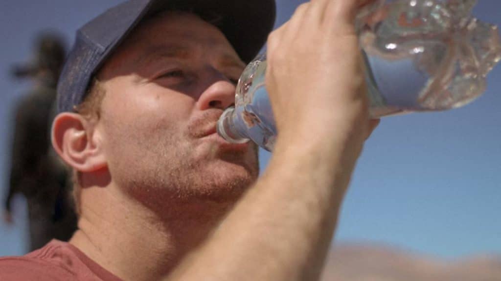 Man choosing water to stay energized throughout the day.