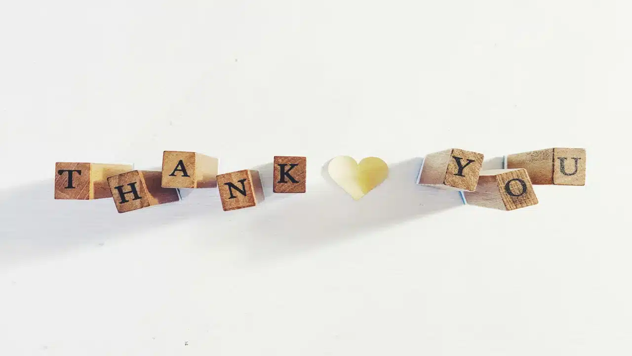 Wooden blocks saying “thank you”.