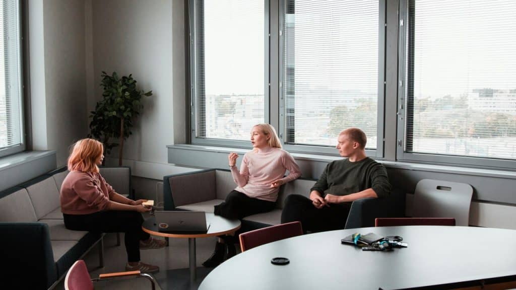 Colleagues talking in the break room